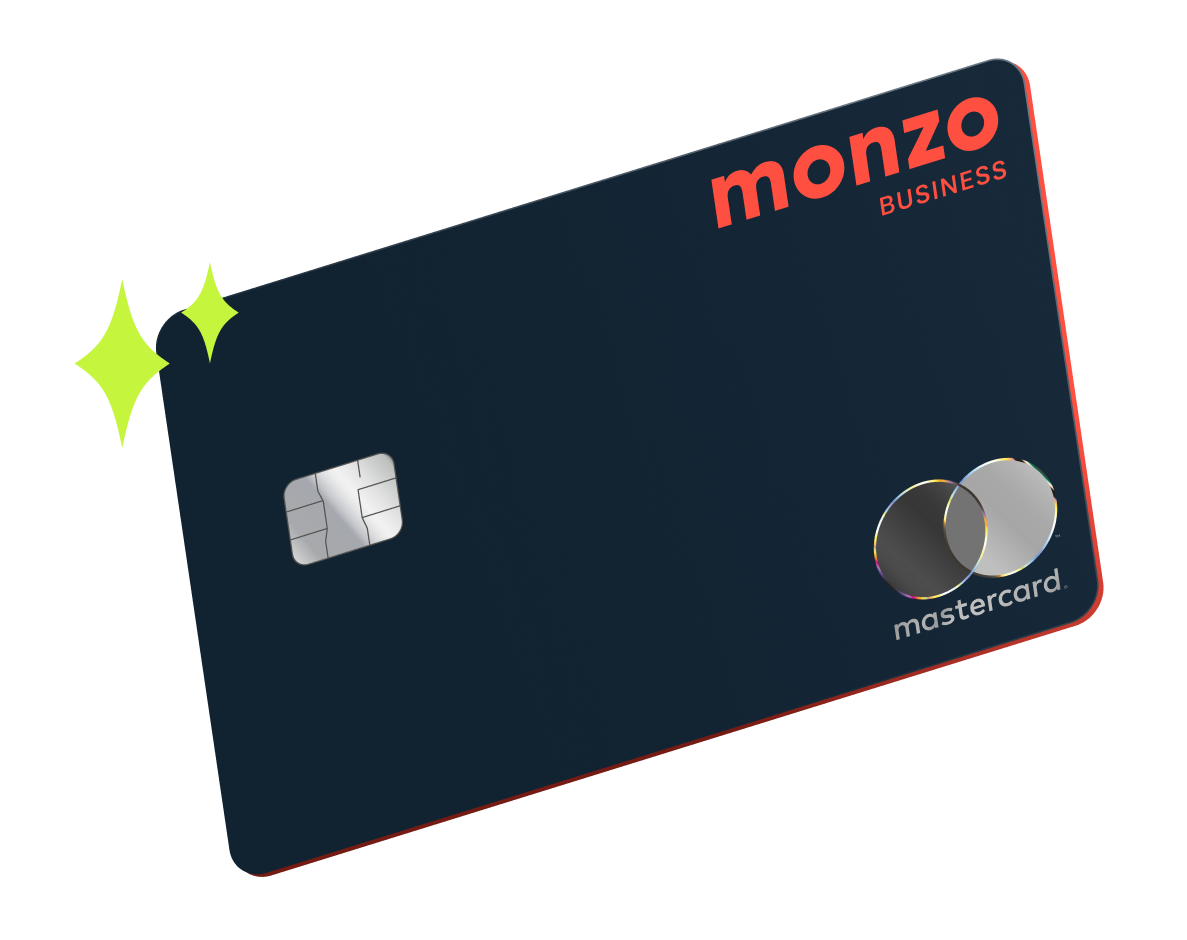 A dark navy Monzo bank card with a metallic Mastercard logo